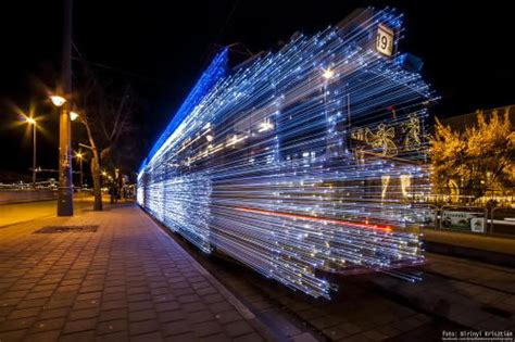 Long Exposure Photos Of Budapest Trams Lit Up With