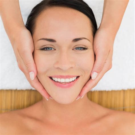 Peaceful Brunette Enjoying A Facial Massage Stock Photo Image Of Lifestyle Attractive