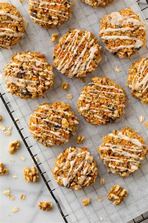 Tender oatmeal cookies filled with cinnamon, grated carrots and coconut and filled with cream cheese frosting. Carrot Cookies with Orange Icing | Simple and Healthy
