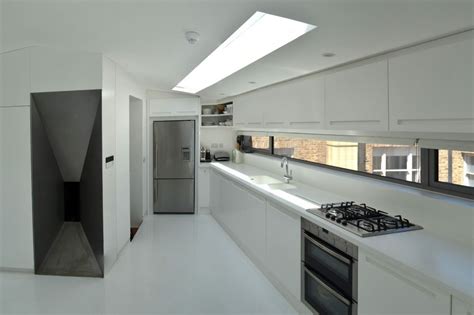 The designs represent functionalities, modern aesthetics and, at the same time, providing perfect protection against curious looks. Modern Kitchen Design in Loft Extension, London by Belsize ...