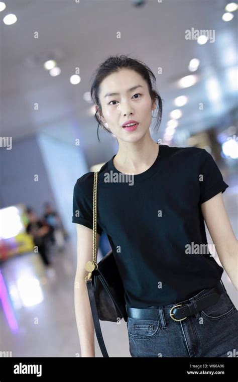 Chinese Model Liu Wen Arrives At The Shanghai Hongqiao International