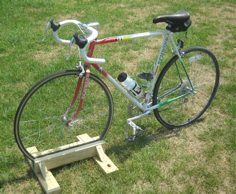 Build a bike repair stand for cheap. DIY Bike Stand | More Triathlon and Swimming ideas