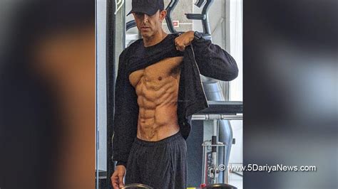 Hrithik Roshan Flaunts Six Pack Abs As He Steps Into