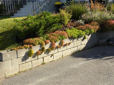 We have gathered 46 amazing pallet ideas for recycling and building pallet furniture and wall hanging structures. How to Build a Cinder Block Retaining Wall - Incoming ...