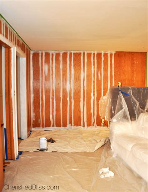Prime the paneling with a stain blocking primer. How to Paint Wood Paneling | Painting wood paneling, Wood paneling makeover, Paneling makeover