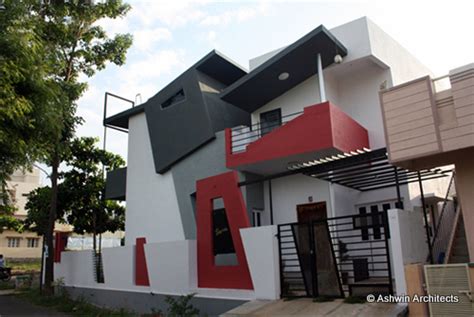 Award winning inside outside house that camouflages with the landscape. Beautiful Front Elevation House Design by Ashwin Architects