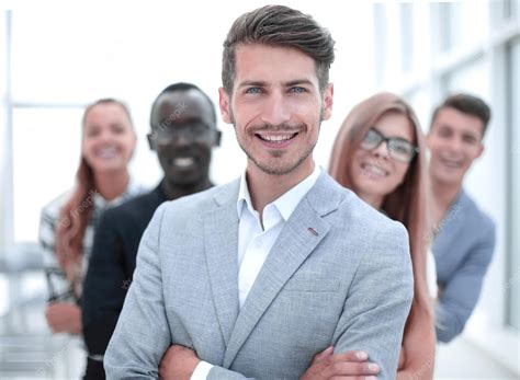 Premium Photo International Business People Standing With Folded Arms