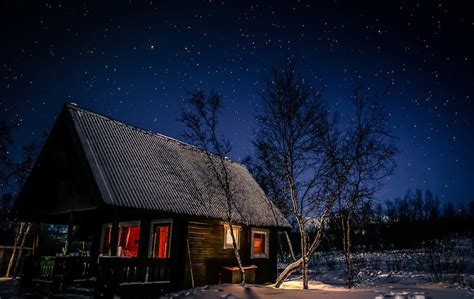 Inviting Log Cabin On Snowy Winter Night Blue Starry Sky Bare
