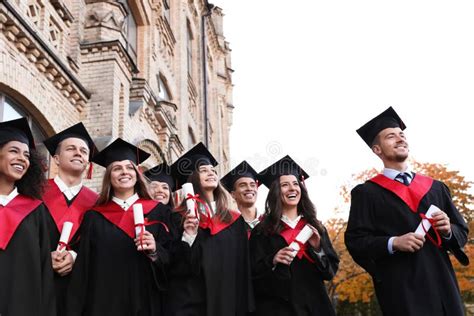 Happy Students With Diplomas Outdoors Graduation Stock Photo Image
