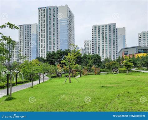 Calm and Peaceful Park Surrounded by High Rise Apartment Building in