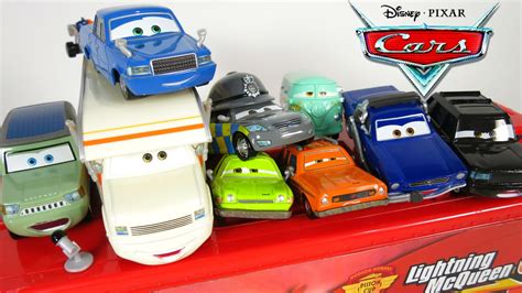 New Disney Pixar Cars 2 Characters Police Larry Camper Miles Axelrod