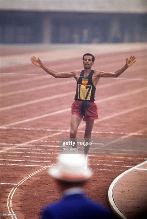 Ethiopia Abebe Bikila In Action Crossing Finish Line To Win Marathon