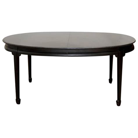 Black lacquered oval dining table made in the Asian taste ...
