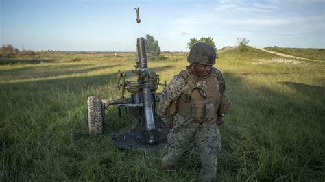 Usmc Sgt Simpson Fires An M327 Mortar During A Live Fire Training