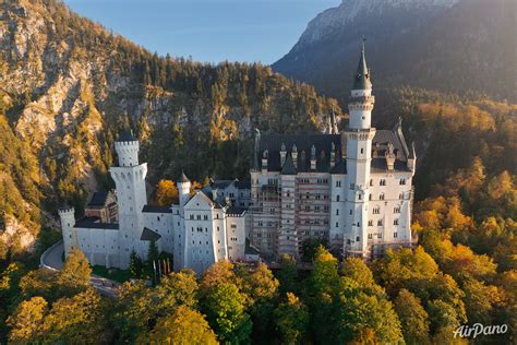 It is situated between the baltic and north seas to the north, and the alps to the south; Germany, Neuschwanstein Castle, autumn colors https ...