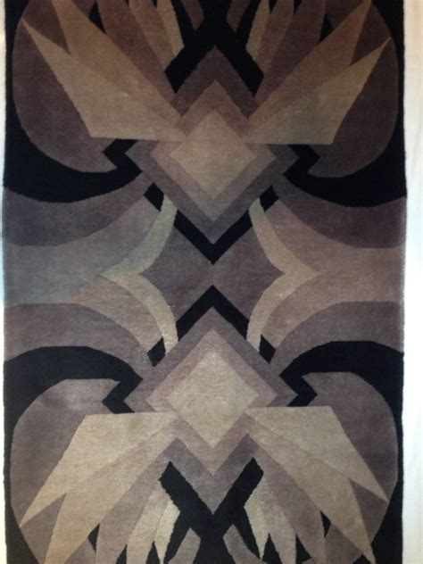 Breaking more new ground in flooring than anyone else. Rare Art Deco Geometric Handmade Wool Rug at 1stdibs