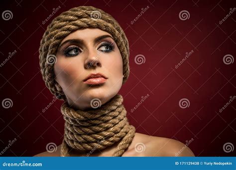 Portrait Of A Beautiful Young Woman With Ropes Stock Photo Image Of