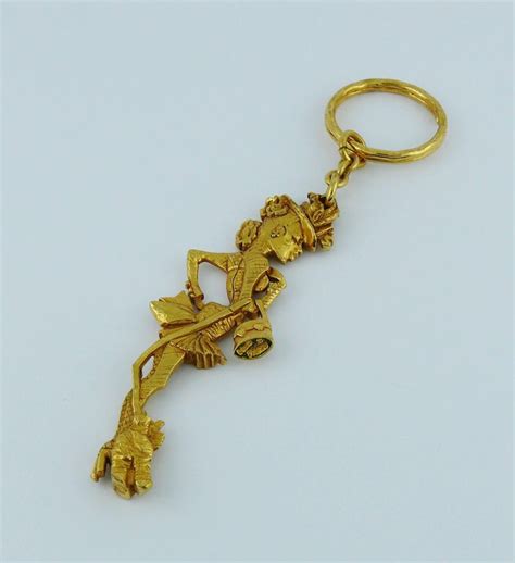 Christian Lacroix Vintage Gold Toned Figural Key Ring Bag Charm At 1stdibs