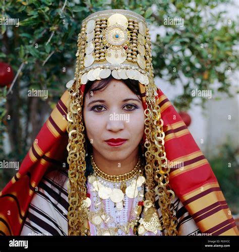 Woman Wearing A Traditional Costume And Berber Jewellery Tunisia Stock