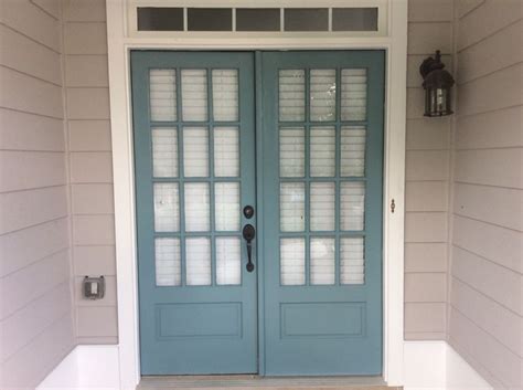 It looks almost black but is actually a very dark shade of gray. Doors - Sherwin Williams Moody Blue | House paint exterior ...