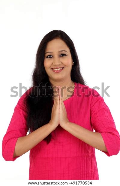 Smiling Young Woman Greeting Namasthe Against Stock Photo 491770534