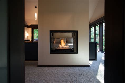 Double Sided Fireplace In Master Suite