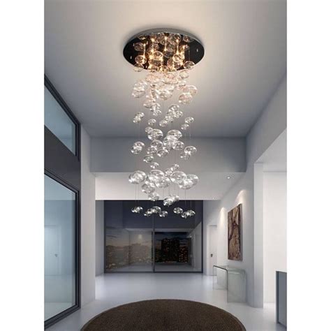 The pendant light's bigger, bolder, more glamorous cousin, the chandelier, might not be for every space, but in certain rooms (the centre of a staircase, for one) its size and statement are just what's called for. Something to Talk About: Statement Lighting |Moss Manor