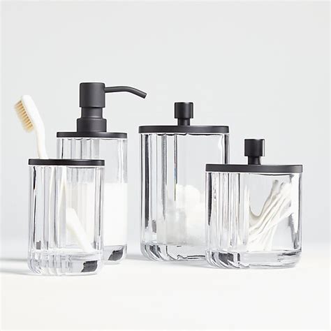 First, straighten up the vanity with sink accessories: Ribbed Glass Bath Accessories | Crate and Barrel Canada
