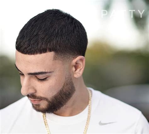 A low skin fade creates a flattering new hairline that also highlights thick hair on top. Temple Fade Haircuts (2020 Styles)