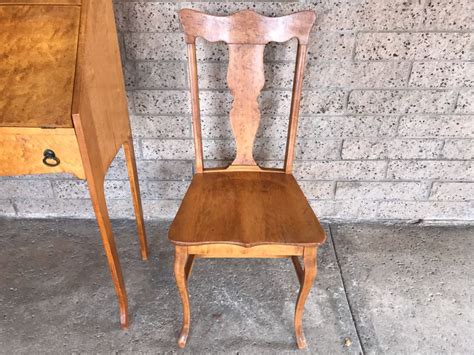 Victorian antique desks tend to be rectangular or circular in shape, with some styles having leather material on the flat surface. Antique Birdseye Maple Secretary Desk With Chair