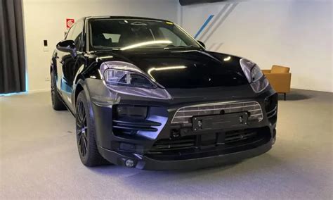 Porsches Ev Macan Spied With Split Headlights And No Camo Topcarnews
