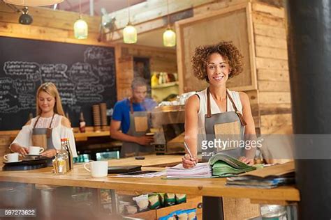 Busy Coffee Shop Owner Photos And Premium High Res Pictures Getty Images
