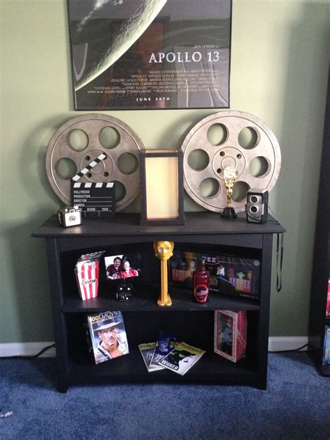 Decorate your family room with movie theater themed decor for a fun mini theater room experience! Pin by Susan Hurst on For the Home | Movie themed rooms ...