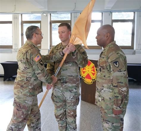 New Garrison Headquarters And Headquarters Company Command Team Takes