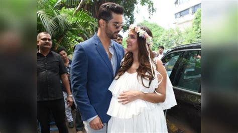 pregnant neha dhupia looks like a glowing angel as she poses with hubby angad bedi indiatoday