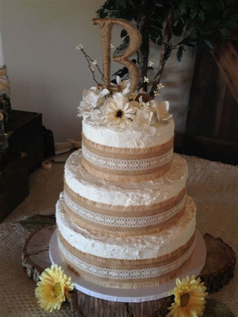 Rustic Theme Wedding Cake Borders Are Burlap With Lace And Flowers Are