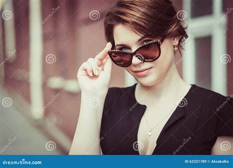 Close Up Of Beautiful Brunette Model In Stylish Sunglasses Stock Image