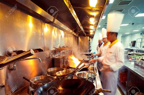 25670914 Motion Chefs Of A Restaurant Kitchen Stock Photo Restaurant