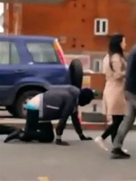 Watch Bizarre Clip Of Woman Casually Walking Man Like A Dog Down The