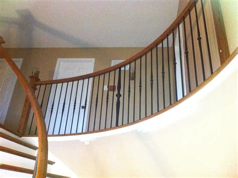 Customer photos sent to us. Stairs with black metal spindles - Ottawa Stairs and Railings