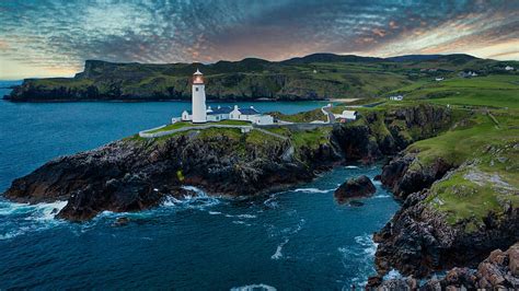 Fanad Head Lighthouse Ireland Mountains Ocean Waves Under Blue Sky