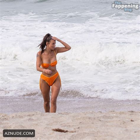 Aesha Scott Sexy Shows Off Her Amazing Body Wearing A Hot Orange Bikini