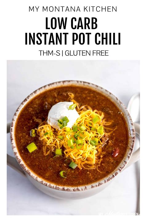 a bowl of chili soup with sour cream on top and the title overlay reads my montana kitchen low
