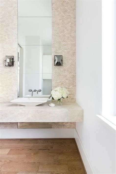 Contemporary Powder Room Featuring A Cream Floating Vanity With A White