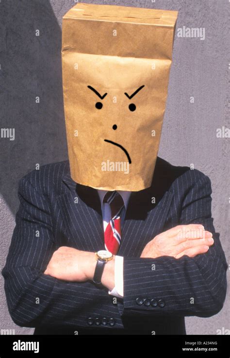 Businessman With Brown Paper Bag Over His Head Frowning Stock Photo Alamy