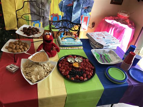 In the u.s., a muppet named lily explains that she does not always have enough food and must go to the food pantry with her family, and alex is a muppet whose father is in prison, and that makes him feel. Sesame Street Elmo food table | Food table, Food, Elmo