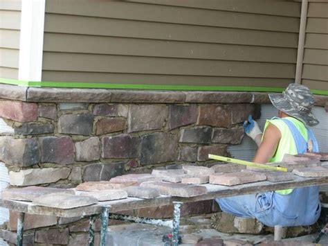 Stone veneer over concrete foundation walls - this is the right idea