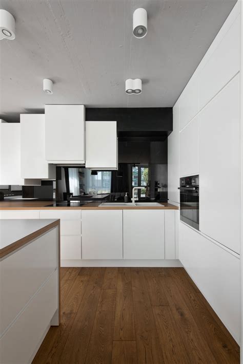 If you want to create a real scandinavian style kitchen, your best bet is to opt for all white units and general décor. Scandinavian interior design in a beautiful small apartment - Architecture Beast