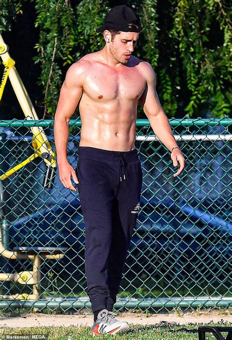 Gregg Sulkin Looks Hunky As He Strips Off His Shirt During A Socially