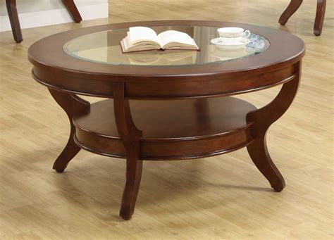 This dining table can be perfect for intimate family dinner or a cocktail party with friends. Homelegance Avalon Round Cocktail Table with Glass Insert 1205-01 at Homelement.com